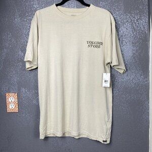 Volcom dooby short sleeve tee. “Embrace the Strange”. tan. Size small
